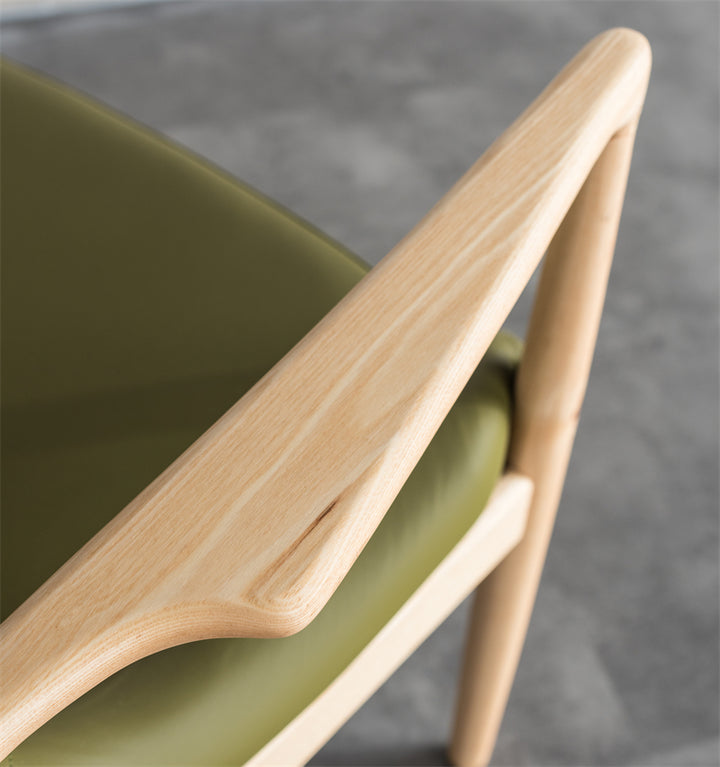 Fauteuil Taikoch en cuir synthétique et bois massif - Fainko