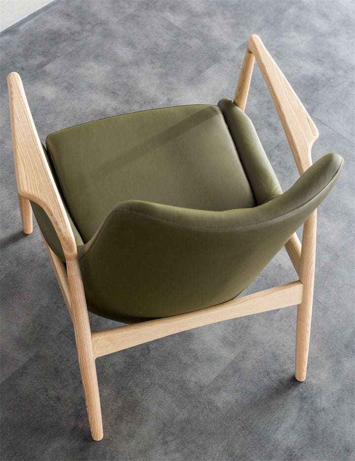 Fauteuil Taikoch en cuir synthétique et bois massif - Fainko